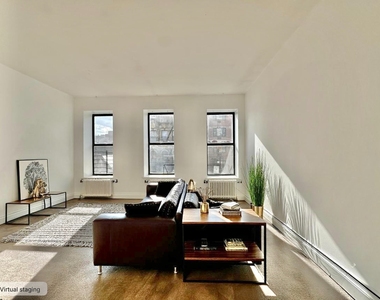 217 East 118th Street - Photo Thumbnail 0