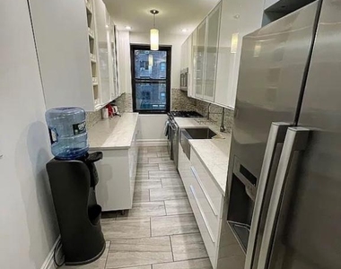 East 37th Street - Photo Thumbnail 7