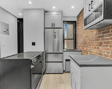 438 West 52nd Street - Photo Thumbnail 3