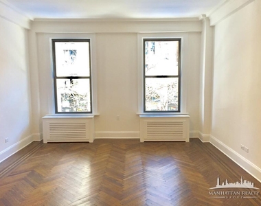 W 72nd St - Photo Thumbnail 1