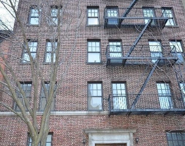 W 11th St - Photo Thumbnail 7