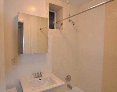 W 11th St - Photo Thumbnail 5