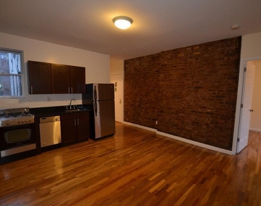 W 11th St - Photo Thumbnail 1
