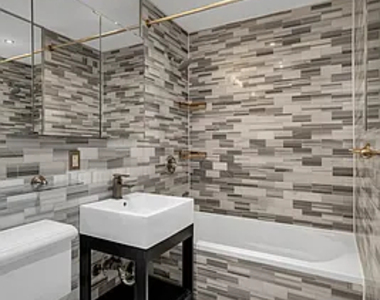 338 East 100th Street - Photo Thumbnail 4