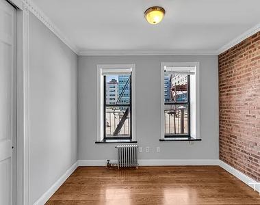 338 East 100th Street - Photo Thumbnail 3