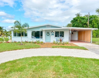 1315 Ne Flora Place - Photo Thumbnail 1