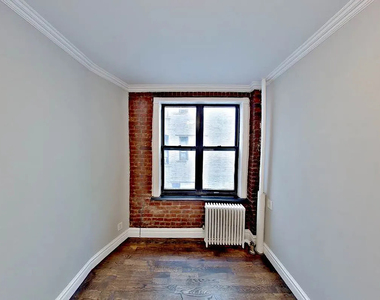 416 East 13th Street - Photo Thumbnail 2
