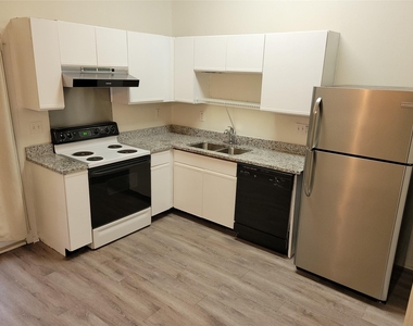 1015 E Yager Ln - Photo Thumbnail 2
