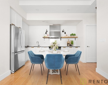 55-27 Myrtle Avenue - Photo Thumbnail 2