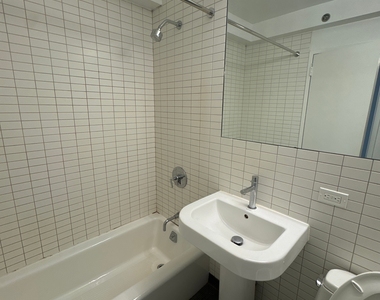 E 39th St - Photo Thumbnail 12