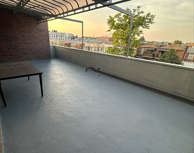 1448 71st Street - Photo Thumbnail 3