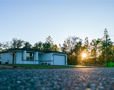 10034 N Darwin Way - Photo Thumbnail 1