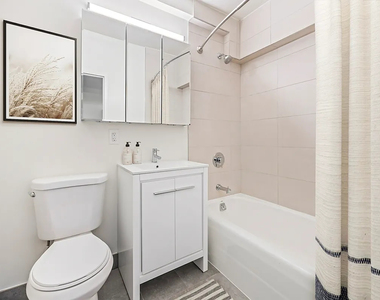 E 15TH ST - Photo Thumbnail 5