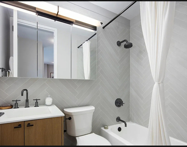 560 West 43rd Street - Photo Thumbnail 1