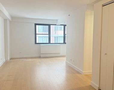 E 39th St - Photo Thumbnail 5