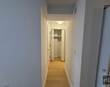 E 39th St - Photo Thumbnail 9