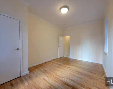 East 38 Street - Photo Thumbnail 2