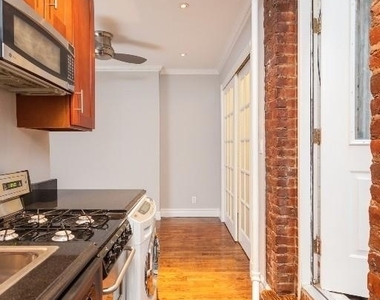 East 13th Street - Photo Thumbnail 14