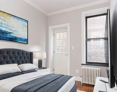 East 32nd St - Photo Thumbnail 1