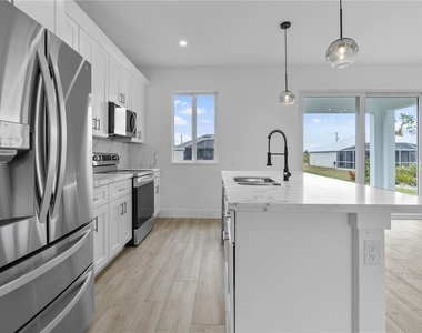13438 Mcintosh Avenue - Photo Thumbnail 18