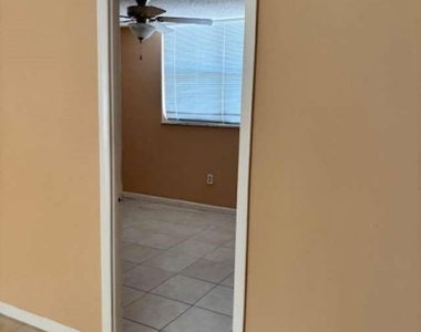 9401 Lime Bay Boulevard - Photo Thumbnail 15