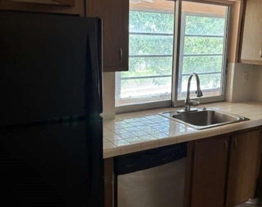 9401 Lime Bay Boulevard - Photo Thumbnail 23