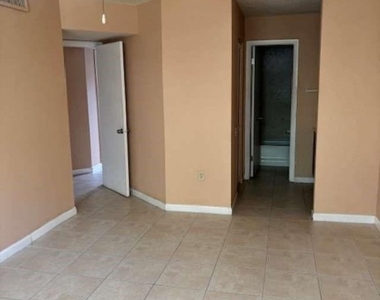 9401 Lime Bay Boulevard - Photo Thumbnail 6