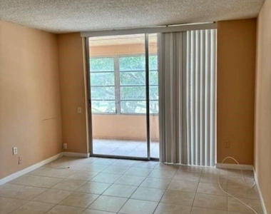 9401 Lime Bay Boulevard - Photo Thumbnail 12