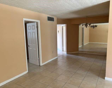 9401 Lime Bay Boulevard - Photo Thumbnail 13
