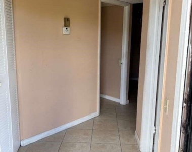 9401 Lime Bay Boulevard - Photo Thumbnail 3