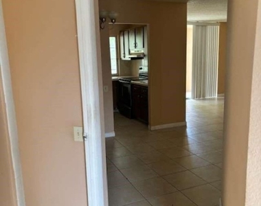 9401 Lime Bay Boulevard - Photo Thumbnail 5
