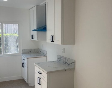 1101 W 106th Street - Photo Thumbnail 2