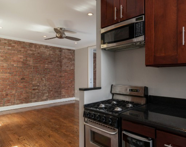 E 100th St. - Photo Thumbnail 4