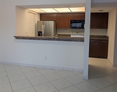 1061 Nw 122nd Terrace - Photo Thumbnail 2