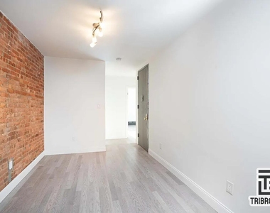 407 E 117th Street - Photo Thumbnail 1