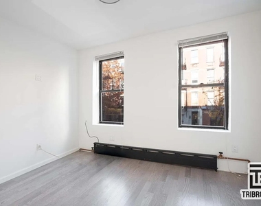 407 E 117th Street - Photo Thumbnail 3