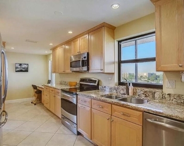 5911 Midnight Pass Road - Photo Thumbnail 9