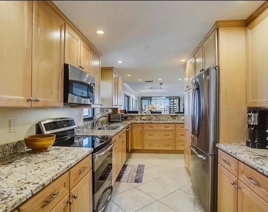 5911 Midnight Pass Road - Photo Thumbnail 11