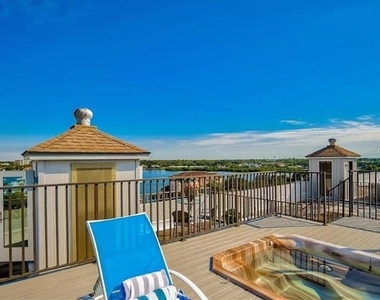 5911 Midnight Pass Road - Photo Thumbnail 22