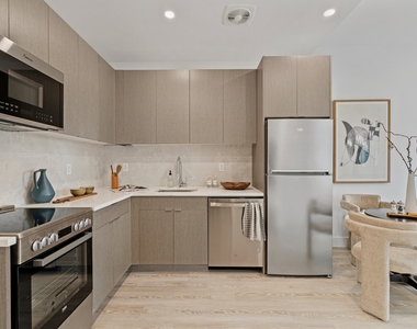 702 East 32nd Street - Photo Thumbnail 1