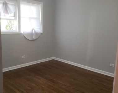 1061 E 80th Street - Photo Thumbnail 4
