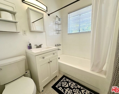 1210 1/2 S Stanley Avenue - Photo Thumbnail 26