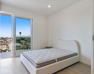 1124 S Normandie Avenue - Photo Thumbnail 2