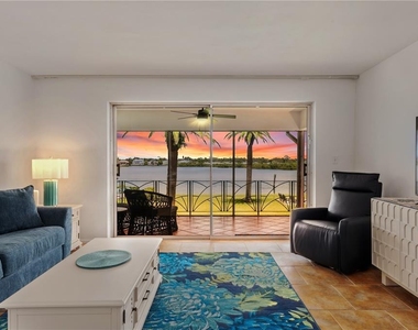 6005 Midnight Pass Road - Photo Thumbnail 1