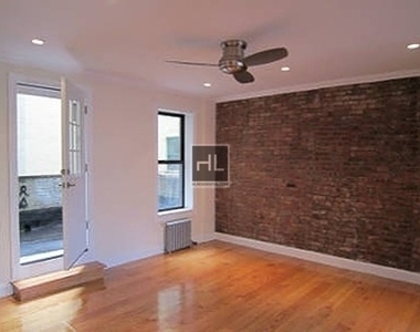 E 100th St. - Photo Thumbnail 2