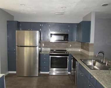 12715 Raeburn Way - Photo Thumbnail 3