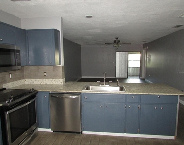 12715 Raeburn Way - Photo Thumbnail 4