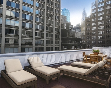 E 46th Street - Photo Thumbnail 7