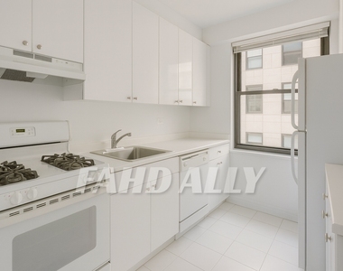 E 46th Street - Photo Thumbnail 1