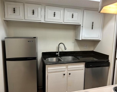 5921 Harvest Hill Road - Photo Thumbnail 5